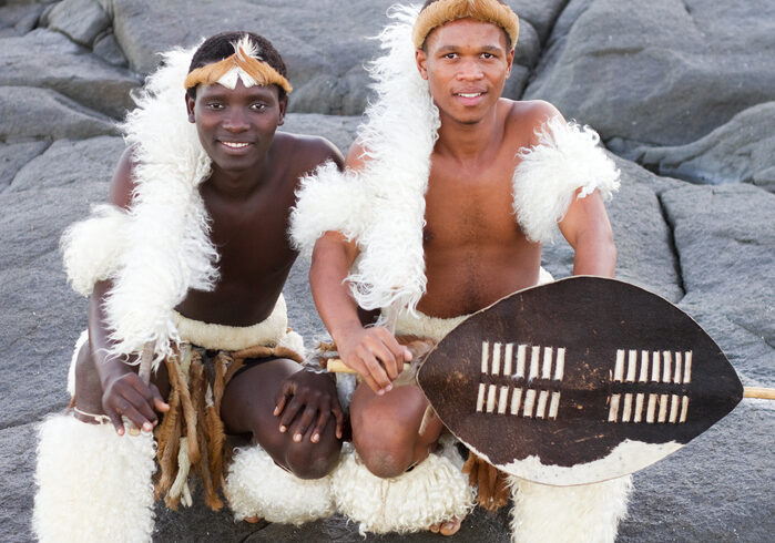 traditional african men on beach